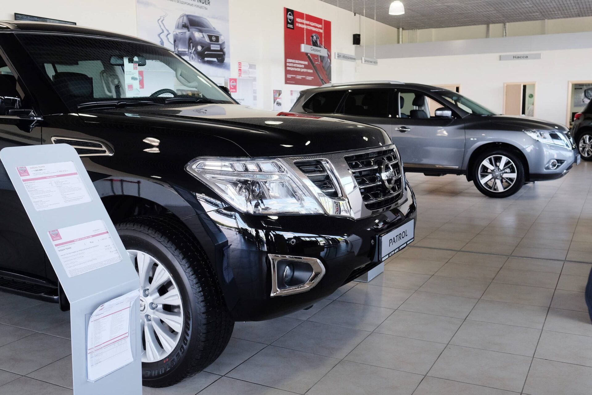 CARS IN DEALER SHOWROOM